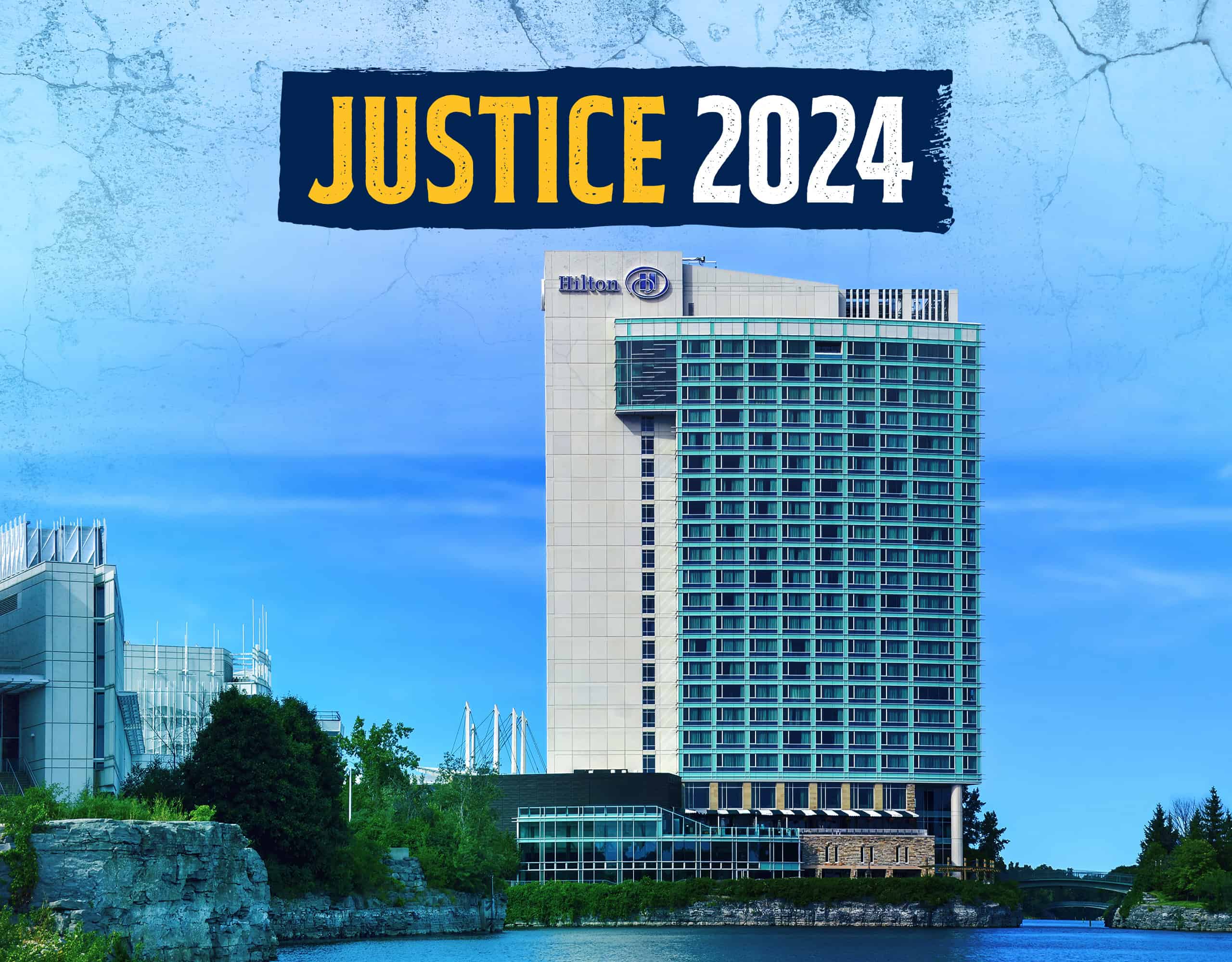 A photo of a Hilton hotel by a lake with the logo of the Justice conference 2024 at the very top.