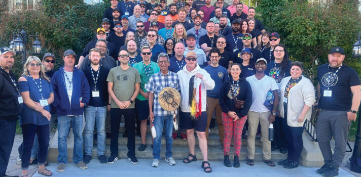 a group of people standing for a photo