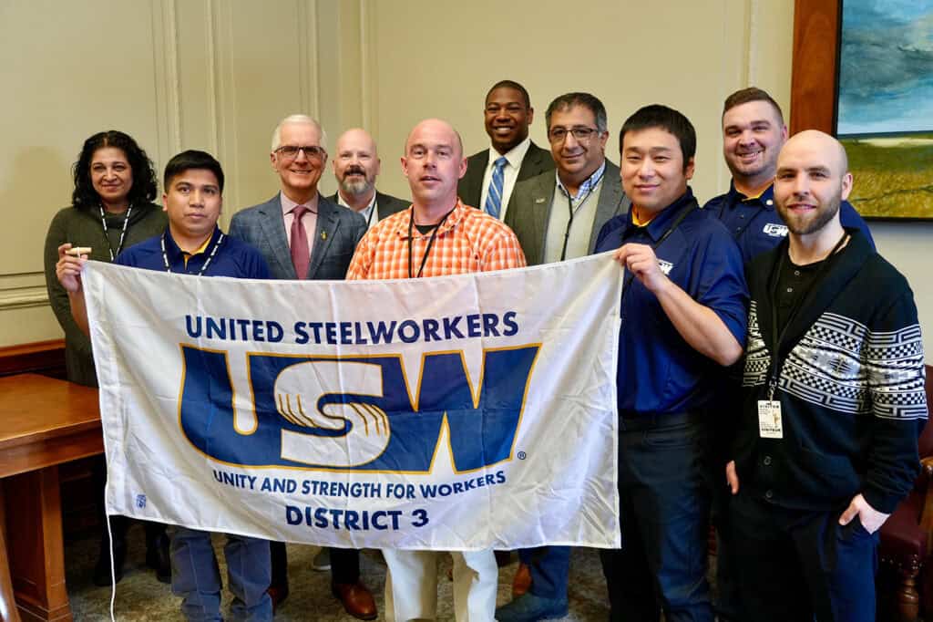 Nello Altomare with a group of Steelworkers