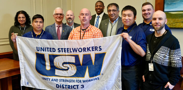 Nello Altomare with a group of Steelworkers