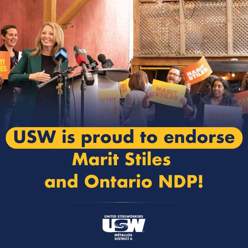 A photo of a person standing on stage during a press conference while smiling to the audience. There are people behind the stage holding signs with text saying Marit Stiles. There is a bold text under the photo saying: USW is proud to endorse MArit Stiles and Ontario NDP.